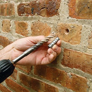 drill holes in walls